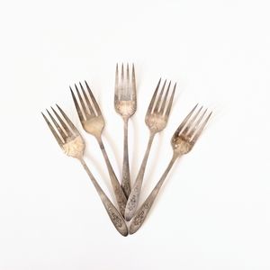 Antique brass forks